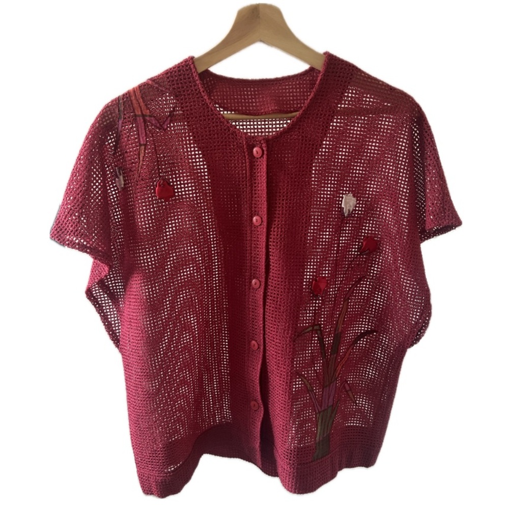 Stylish-red mesh, button up top. Intricate floral and beaded embellishments.
